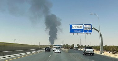 A large plume of black smoke rises from the fuel storage area at King Khalid International Airport in Riyadh, Saudi Arabia, Sept. 19, 2026. (Reuters Photo)
