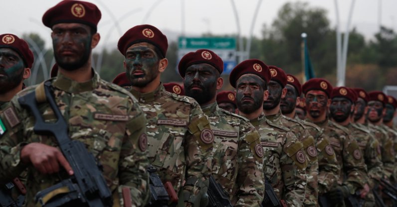 New Syrian army troops stand in formation during celebrations marking the first anniversary of the ousting of Bashar Assad, in Damascus, Syria, Dec. 8, 2025. (AP Photo)
