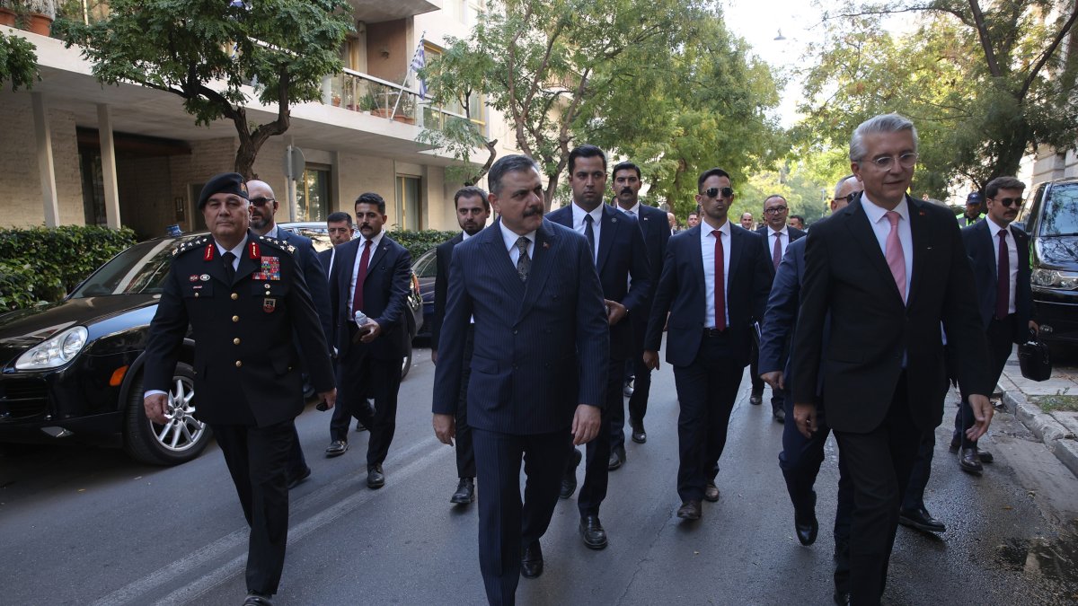 Interior Minister Mustafa Çiftçi (C), accompanied by his delegation, arrives to speak to the media during his visit to Athens, Greece, Oct. 9, 2026. (AA Photo)