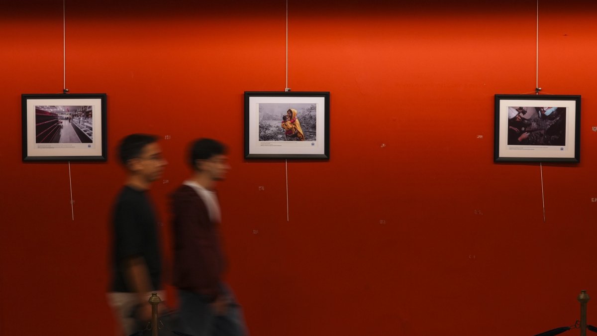 Visitors walk through the “A Day in Gaza” photo exhibition, Izmir, Türkiye, Oct. 7, 2026. (AA Photo)