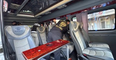 Police officers inspect a bus during a security operation, Istanbul, Türkiye, Sept. 13, 2026. (AA Photo)