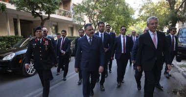 Interior Minister Mustafa Çiftçi (C), accompanied by his delegation, arrives to speak to the media during his visit to Athens, Greece, Oct. 9, 2026. (AA Photo)