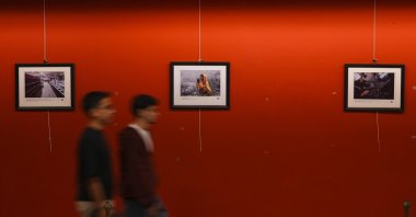 Visitors walk through the “A Day in Gaza” photo exhibition, Izmir, Türkiye, Oct. 7, 2026. (AA Photo)