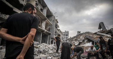 Palestinians inspect the rubble of destroyed homes following an Israeli airstrike in the Al-Sabra neighborhood, Gaza City, Palestine, Oct. 9, 2026. (EPA Photo)