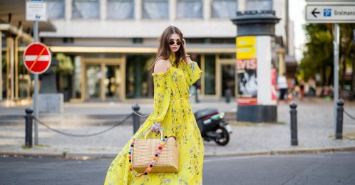 Maxilie Mlinarskij wearing a yellow maxi dress, Berlin, Germany, Aug. 5, 2018. (Getty Images Photo)
