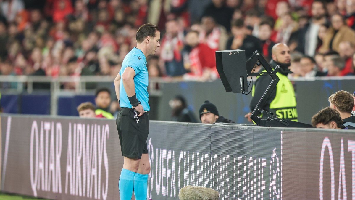 Referee Danny Makkelie checks the VAR monitor during the UEFA Champions League match between Benfica and Barcelona at Estadio da Luz, Lisbon, Portugal, Jan. 21, 2025. (Shutterstock Photo)