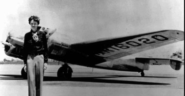 In this undated file photo, Amelia Earhart stands next to a Lockheed Electra 10E, before her last flight in 1937 from Oakland, Calif., bound for Honolulu on the first leg of her record-setting attempt to circumnavigate the world westward along the Equator. (AP Photo)