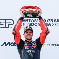 Aprilia Racing's rider Marco Bezzecchi celebrates on the podium after winning the Indonesia MotoGP in Mandalika, Indonesia, Oct. 11, 2026. (EPA Photo)
