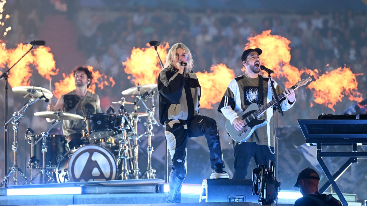 Emily Armstrong, lead singer of Linkin Park, performs alongside Mike Shinoda, during the prematch ceremony to the UEFA Champions League Final 2025, Munich, Germany, May 31, 2025. (Getty Images Photo)