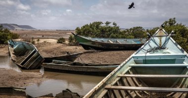 Boats seized from smugglers attempting to transport migrants to Yemen are stored at a Coast Guard post in Khor Angar, Djibouti, April 12, 2026. (AFP Photo)