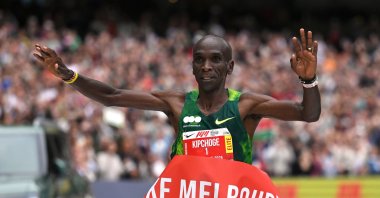 Kenya's Eliud Kipchoge crosses the finish line to win the men's race at Melbourne Marathon in Melbourne, Australia, Oct. 11, 2026. (AP Photo)