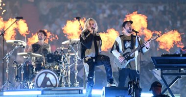 Emily Armstrong, lead singer of Linkin Park, performs alongside Mike Shinoda, during the prematch ceremony to the UEFA Champions League Final 2025, Munich, Germany, May 31, 2025. (Getty Images Photo)