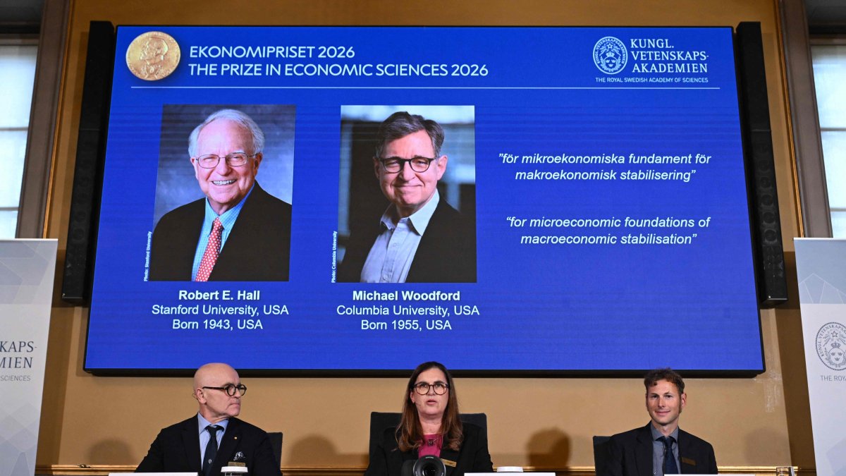 Secretary-General of the Royal Swedish Academy of Sciences Ellen Moons (C), Chair of the Prize Committee John Hassler (L) and Member of the Prize Committee and expert Timo Boppart announce U.S. macroeconomists Robert E. Hall and Michael Woodford as the winners of the 2026 Sveriges Riksbank Prize in Economic Sciences in Memory of Alfred Nobel at the Royal Swedish Academy of Sciences in Stockholm, Sweden, Oct. 12, 2026. (AFP Photo)