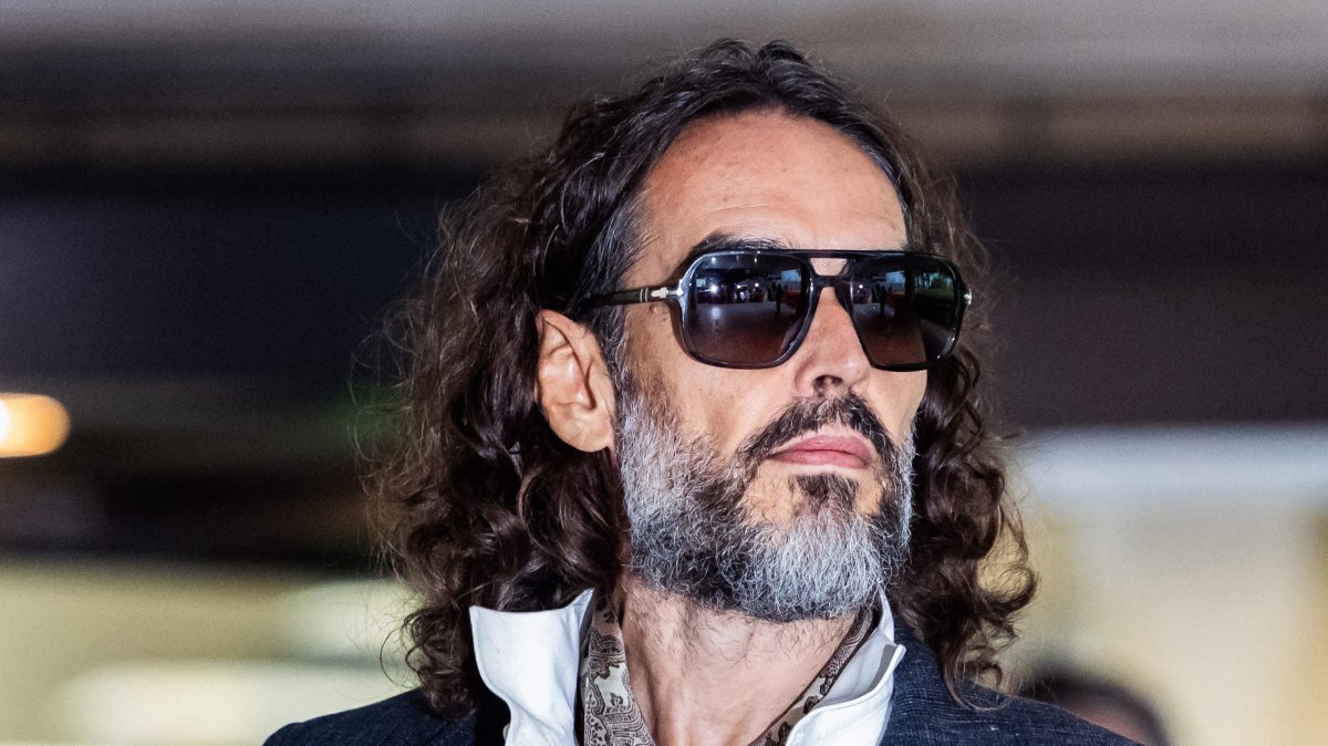 British comedian and actor Russell Brand leaves Southwark Crown Court after pleading not guilty to three charges of rape, indecent assault and three counts of sexual assault, London, U.K., Oct. 12, 2026. (AFP Photo)