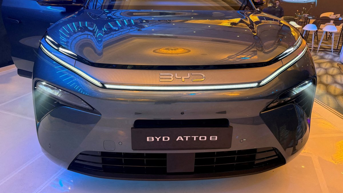 A plug-in hybrid BYD ATTO 8 SUV is displayed at the launch event, Johannesburg, South Africa, April 15, 2026. (Reuters Photo)