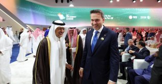 Energy and Natural Resources Minister Alparslan Bayraktar (R) and Saudi Energy Minister Prince Abdulaziz bin Salman at the 25th WPC Energy Congress, Riyadh, Saudi Arabia, Oct. 12, 2026. (IHA Photo)