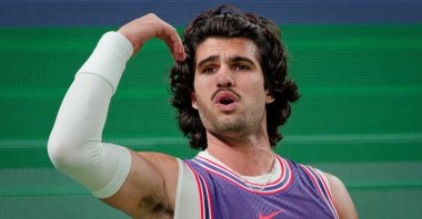 Spain's Carlos Alcaraz reacts during his men's singles match against Zizou Bergs of Belgium at the Shanghai Masters, Shanghai, China, Oct. 12, 2026. (EPA Photo)