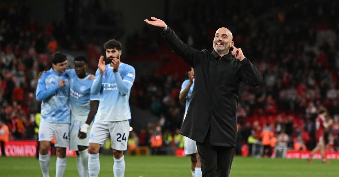 Manchester City's manager Enzo Maresca (R) celebrates on the pitch after a Premier League match against Liverpool at Anfield, in Liverpool, U.K., Oct. 11, 2026. (AFP Photo)