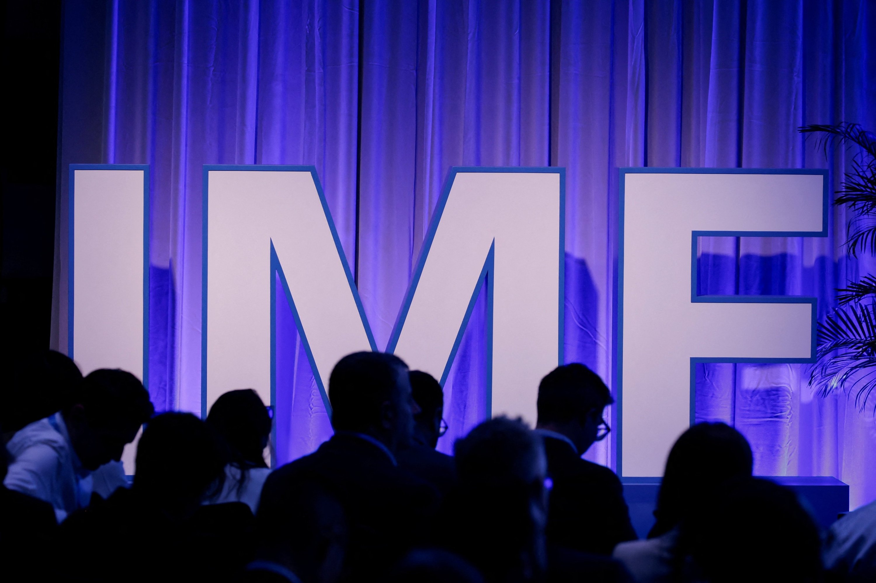 IMF lifts global growth forecast, warns of AI boom, debt risks
