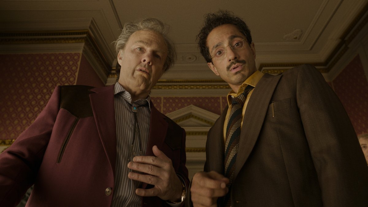 This image released by Warner Bros. Pictures shows Tom Cruise (L) and Riz Ahmed in a scene from "Digger." (AP Photo)