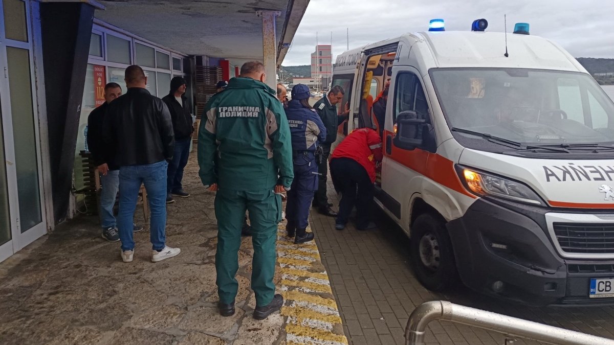 People gather near an ambulance on the day a ship was damaged in a drone attack in Varna, Bulgaria, Oct. 13, 2026. (Reuters Photo)