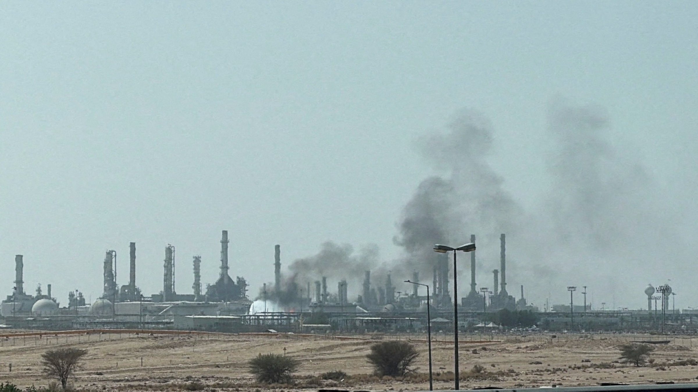 Smoke rises from a fire at the Aramco refinery south of Riyadh, Saudi Arabia, Oct.3, 2026. (Reuters File Photo)