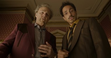 This image released by Warner Bros. Pictures shows Tom Cruise (L) and Riz Ahmed in a scene from "Digger." (AP Photo)