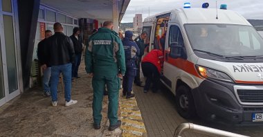 People gather near an ambulance on the day a ship was damaged in a drone attack in Varna, Bulgaria, Oct. 13, 2026. (Reuters Photo)