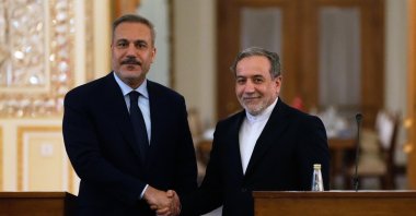 Foreign Minister Hakan Fidan and Iranian Foreign Minister Abbas Araghchi shake hands after their meeting, Tehran, Iran, Nov. 30, 2025. (AP File Photo)