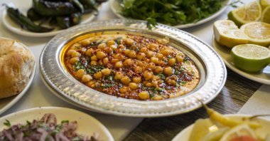 A table set with traditional food from Gaziantep region, Türkiye. (Getty Images Photo)