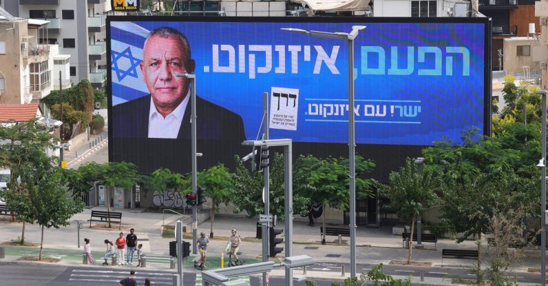 An elections billboard featuring Yashar party leader Gadi Eisenkot reading in Hebrew 'This time, Eisenkot' is displayed in Tel Aviv, Israel, Oct. 12, 2026. (EPA Photo)