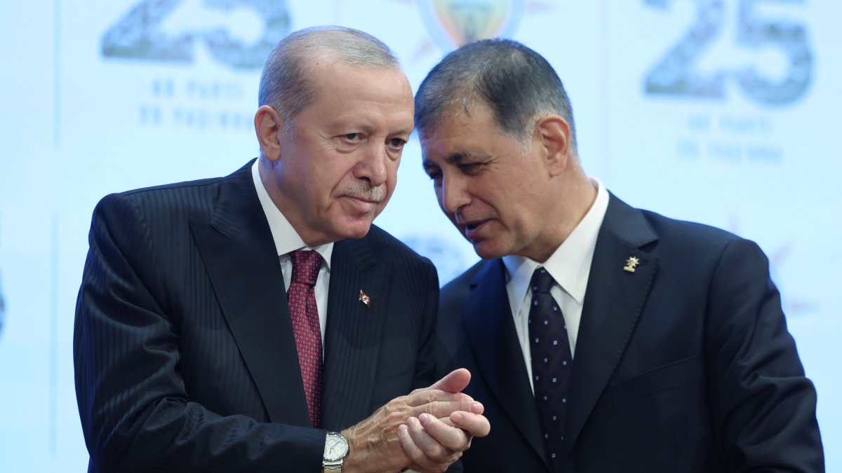 President Recep Tayyip Erdoğan speaks with Cemil Tugay during a ceremony at which the mayor joined the AK Party, Ankara, Türkiye, Oct. 7, 2026. (IHA Photo)