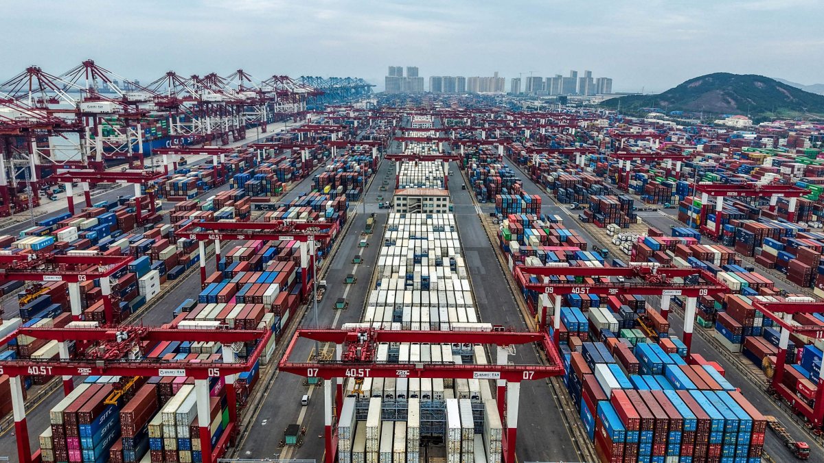 Containers are seen at the port in Qingdao, China, Sept. 21, 2026. (AFP Photo)