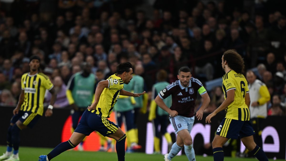 Fenerbahçe's Irfan Can Kahveci (2nd L) vies for the ball with an Aston Villa player during their UEFA Champions League match at Villa Park in Birmingham, England, Oct. 14, 2026. (AA Photo)