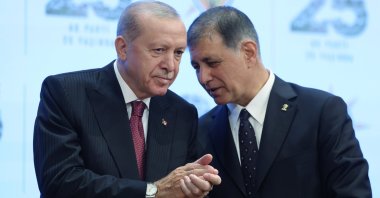 President Recep Tayyip Erdoğan speaks with Cemil Tugay during a ceremony at which the mayor joined the AK Party, Ankara, Türkiye, Oct. 7, 2026. (IHA Photo)