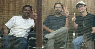 (From R) Saurav Das, chief spokesperson of the Cockroach Janta Party (CJP), Ashutosh Ranka, co-convenner of CJP, and Ajinkya Shinde pose for a picture from inside the Parliament Street Police Station in New Delhi, India, Oct. 14, 2026. (Reuters Photo)