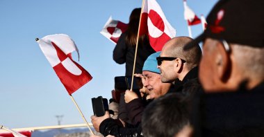 People wait for the arrival of the Greenlandic delegation after they agreed on a security deal with the U.S. and Denmark at Nuuk Airport, Nuuk, Greenland, Sept. 23, 2026. (Reuters Photo)