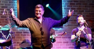 Alpay performs onstage in an undated photo. (DHA Photo)
