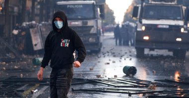 A protestor stands as Albanian students hold an anti-government protest in Tirana, Albania, Oct. 13, 2026. (Reuters Photo)