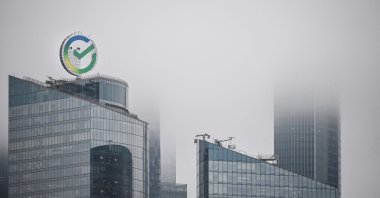 The logo of Russia's state-owned Sberbank is seen atop one of the towers of Moscow's International Business Center (Moskva City) in Moscow, Russia, April 28, 2023. (AFP Photo)