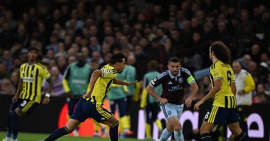 Fenerbahçe's Irfan Can Kahveci (2nd L) vies for the ball with an Aston Villa player during their UEFA Champions League match at Villa Park in Birmingham, England, Oct. 14, 2026. (AA Photo)