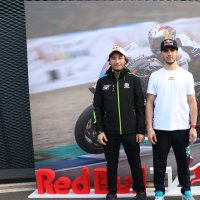 Turkish motorcyclists Can Öncü (L) and Bahattin Sofuoğlu pose for a photo, Istanbul, Türkiye, Feb. 15, 2024. (AA Photo)