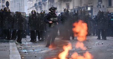 Riot police officers gather as clashes occur after high school students and members of French Unions march, Paris, France, Oct. 13, 2026. (EPA Photo)
