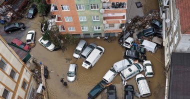 Cars are submerged in floodwater following torrential rain, Istanbul, Türkiye, Oct. 15, 2026. (AA Photo)