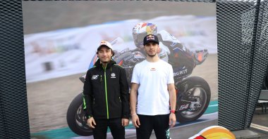 Turkish motorcyclists Can Öncü (L) and Bahattin Sofuoğlu pose for a photo, Istanbul, Türkiye, Feb. 15, 2024. (AA Photo)