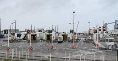 Trucks queue at the Eurotunnel Calais Terminal in Calais, northern France, Dec. 21, 2020. (AFP File Photo)