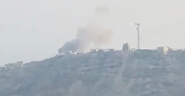 Smoke billows from the presidential palace complex following an attack by Yemen's Houthis, according to government officials, in Aden, Yemen, Oct. 15, 2026, in this screen grab obtained from a social media video. (Social Media/via Reuters)

