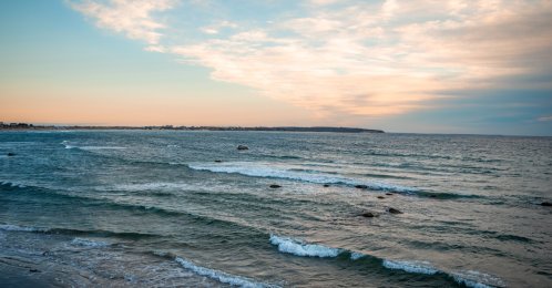 An undated view of waves along the Atlantic Ocean at sunset in Rhode Island, U.S. (Shutterstock Photo)