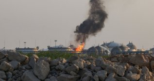 Flames burn at a facility belonging to Saudi oil giant Aramco south of Riyadh, Oct. 3, 2026. (AFP Photo)