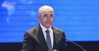 Treasury and Finance Minister Mehmet Şimşek speaks during a summit, Istanbul, Türkiye, Oct. 8, 2026. (AA Photo)